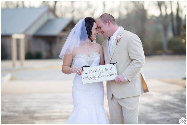Bride and groom hold happily ever after sign after wedding, photographed by Christen Jones Photography | The Pink Bride {10 Steps to Long-Distance Wedding Planning}