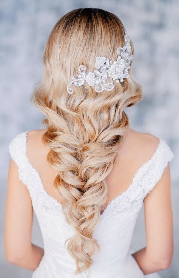 Soft curls woven into a loose braid for brides with long hair by Elstile | The Pink Bride www.thepinkbride.com