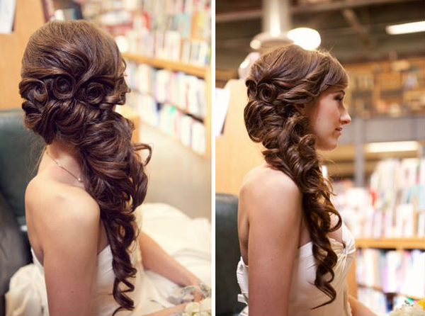 Abundant pinwheel curls into a messy side braid for brides with long hair, photo by Lindsey Shaun Photography | The Pink Bride www.thepinkbride.com