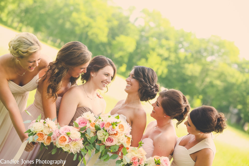 Bride laughing with her bridesmaids. Photo Credit: Candice Jones Photography | The Pink Bride® www.thepinkbride.com