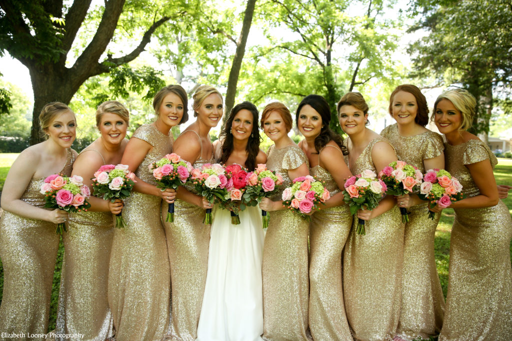 Bride with bridesmaids wearing gold sequin dresses. Photo Credit: Elizabeth Looney Photography | The Pink Bride® www.thepinkbride.com