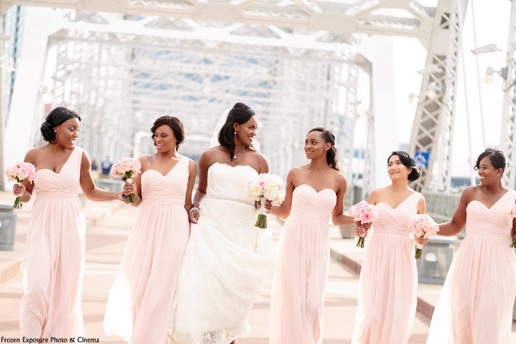 Bride with her bridesmaids wearing long pink chiffon bridesmaid dresses. Photo Credit: Frozen Exposure Photo & Cinema | The Pink Bride® www.thepinkbride.com